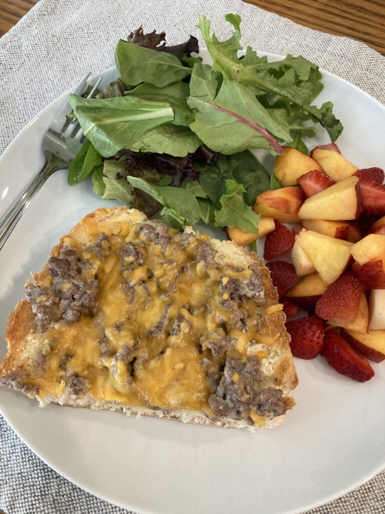 beef stroganoff sandwich served with salad