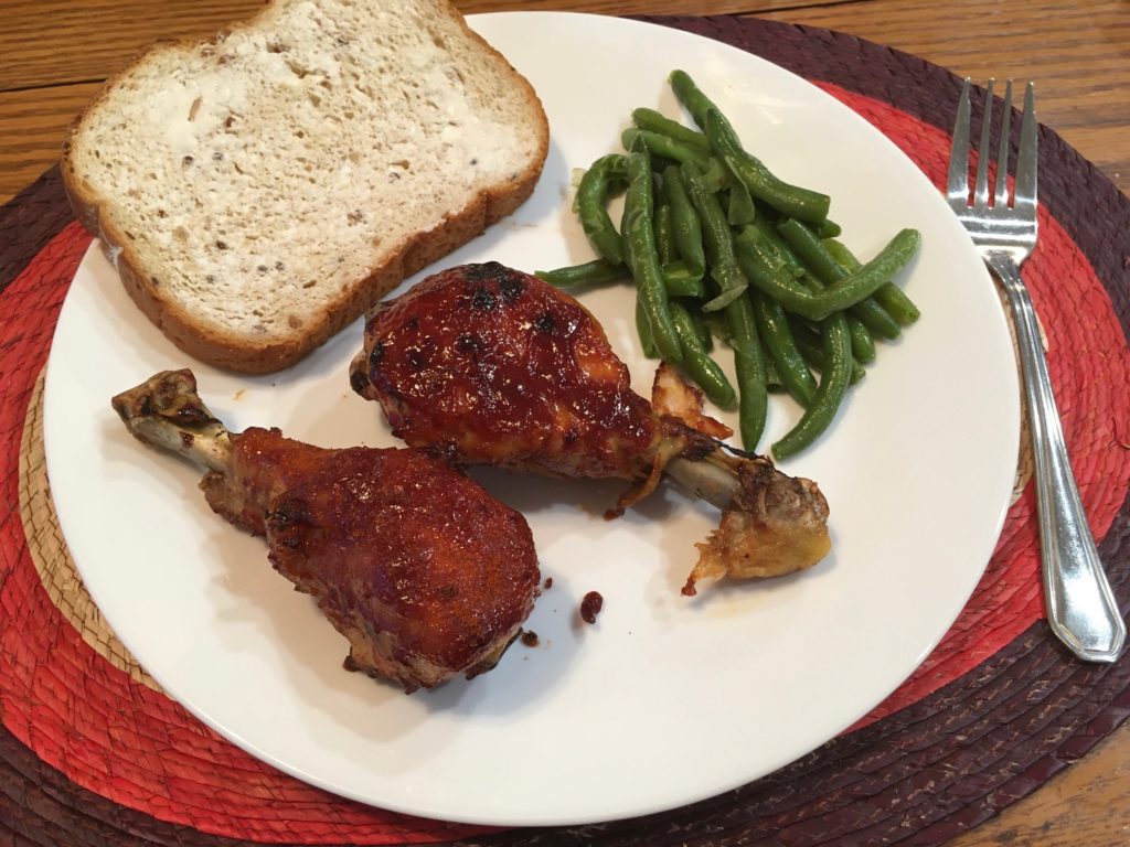 BBQ chicken drumsticks with sides