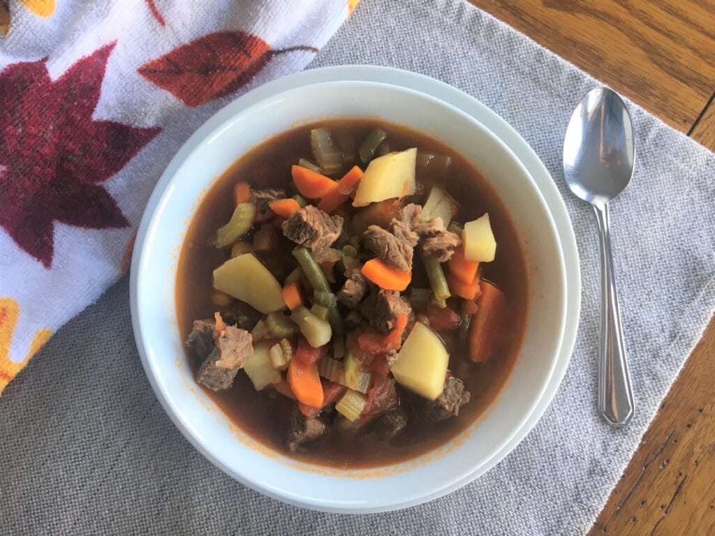 Vegetable Beef Soup in a white bowl