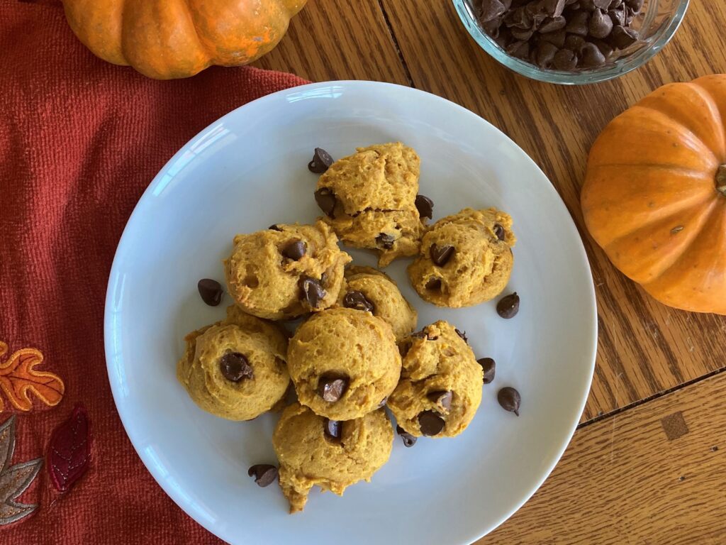 Egg-free pumpkin chocolate chip cookies on a white plate