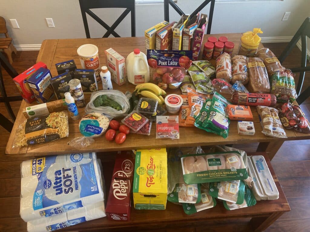 a table full of groceries from Kroger